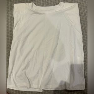 Pilcro solid white/cream top with some shoulder pads, sleeveless, size L